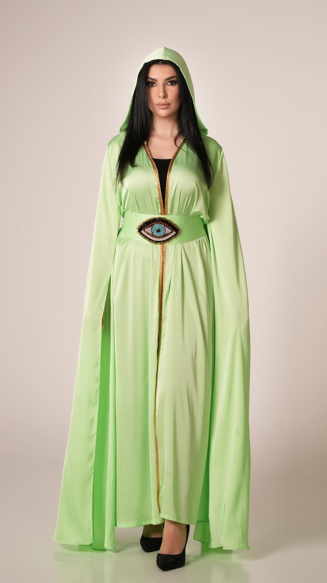 women wearing green kaftan