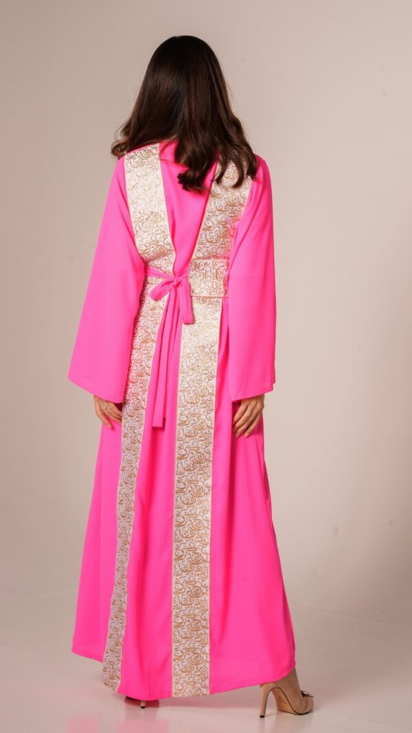 women wearing fuchsia kaftan