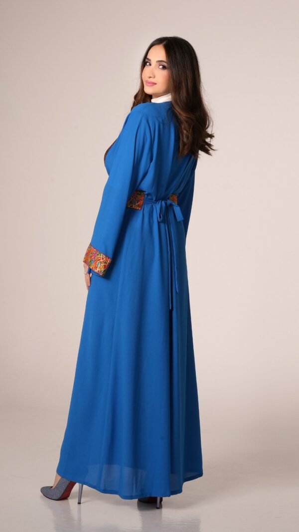 women wearing blue kaftan