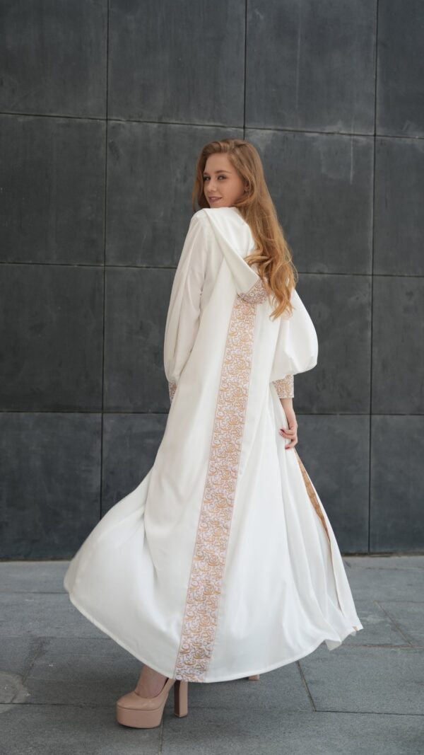 women wearing white kaftan