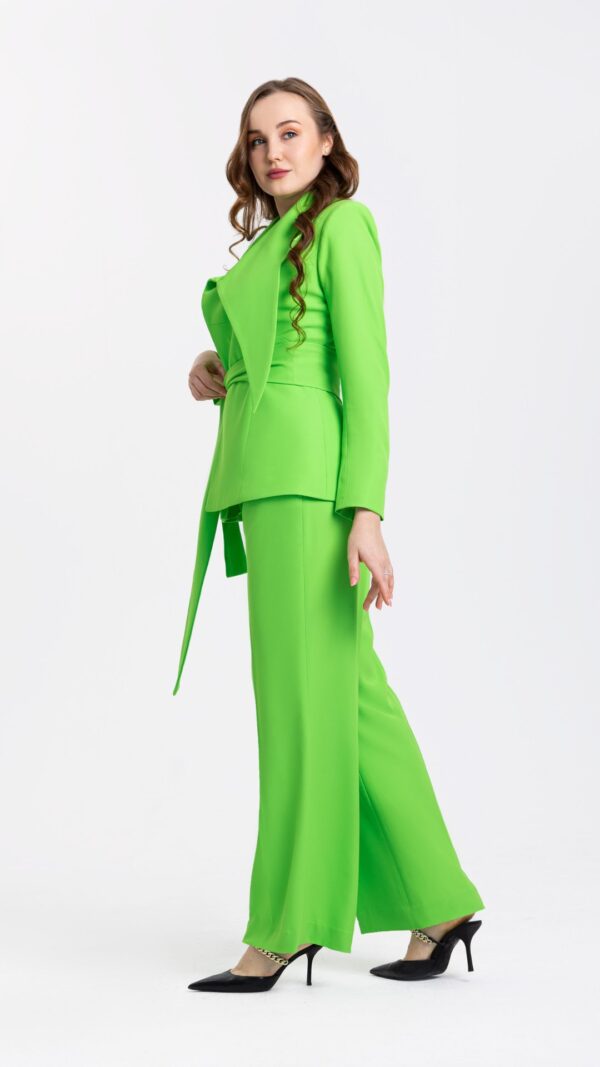 women wearing green suit