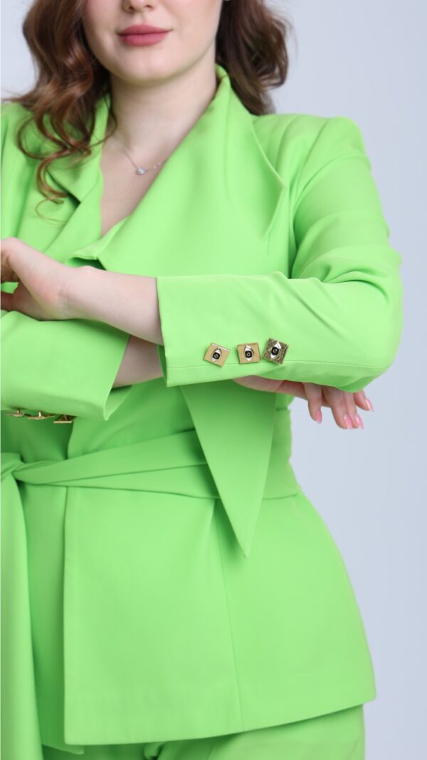 women wearing green suit